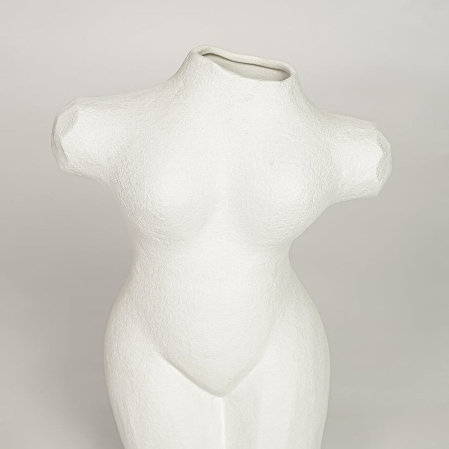 White ceramic female body sculpture vase with textured finish perfect for artistic flower display on console table shelf decor.