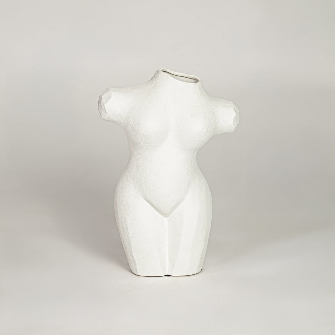 Modern white ceramic female body shaped flower vase ideal for dried floral arrangement on console table shelf and home decor styling.