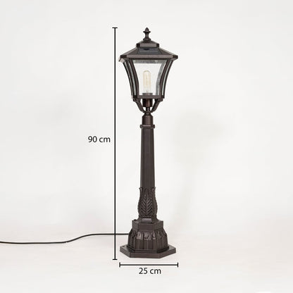 Classic outdoor post lamp in black metal with glass shade showing 90 cm height and 25 cm base width for landscape lighting.