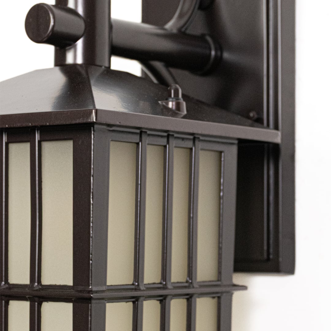 Closeup image of Fig outdoor wall light highlighting compact metal design smooth surface and reliable construction for outdoor wall mounting.