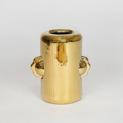 Modern gold decorative flower vase isolated clean background stylish metal vase for home decor accent.