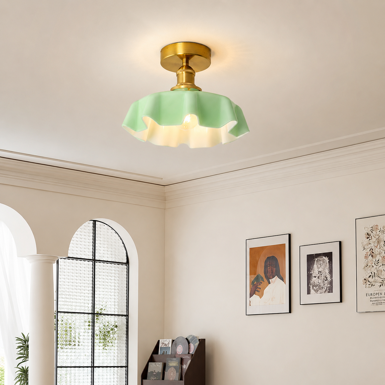 Modern mint green glass ceiling light in dining room setting for elegant interior decor and ambient lighting.