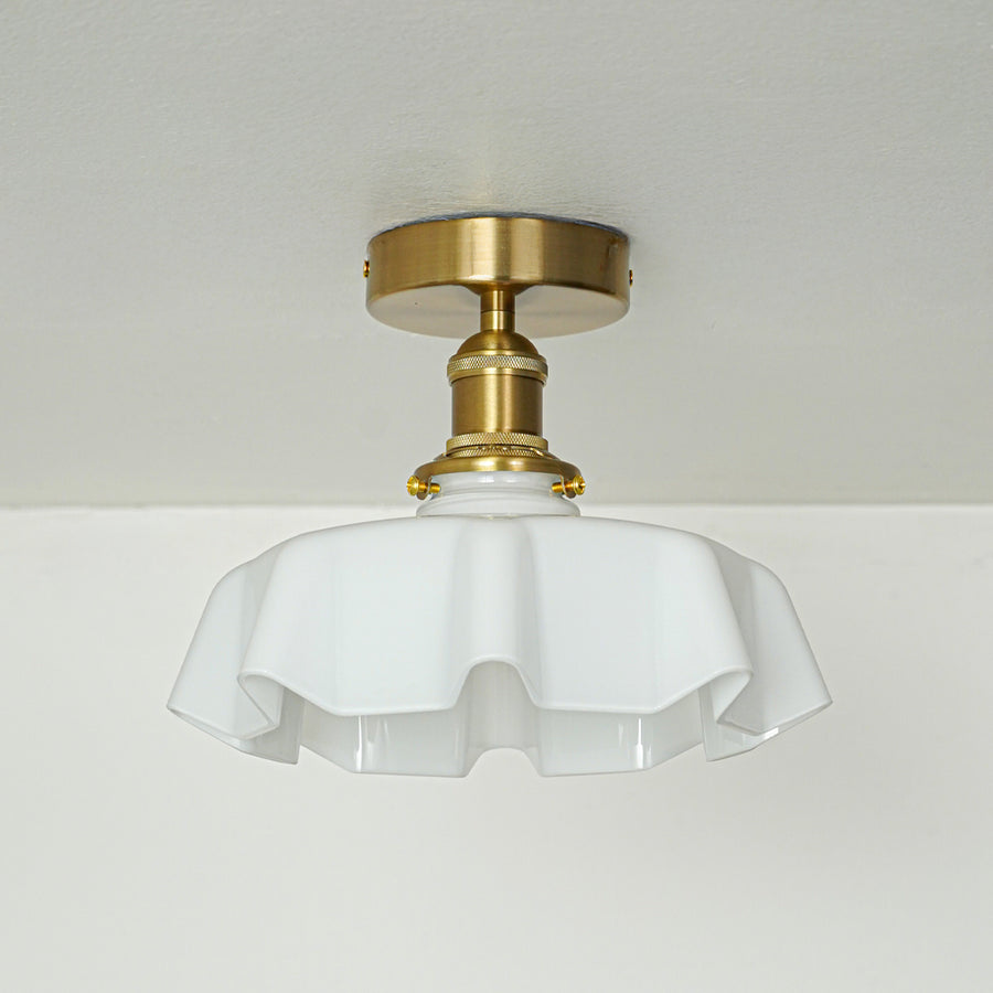 Modern white glass and gold metal ceiling light for classic bedroom and luxury interior decor styling spaces.