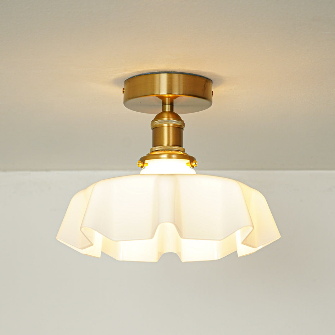 Modern cream glass and gold metal ceiling light for stylish hallway and vintage inspired decor styling spaces.