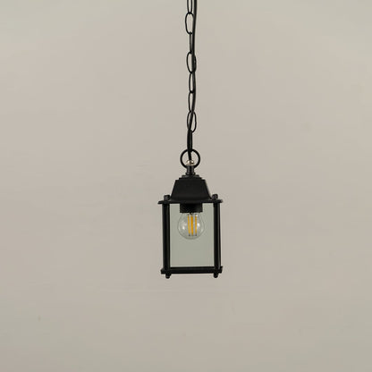 A black square hanging lantern on white background with light off showing clear glass and simple clean metal frame perfect for modern outdoor decor.