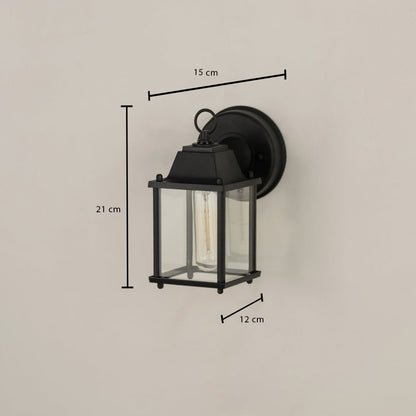 A black outdoor wall light shown on a white background with size markings showing 21 cm height 15 cm width and 12 cm depth providing clear installation measurements.