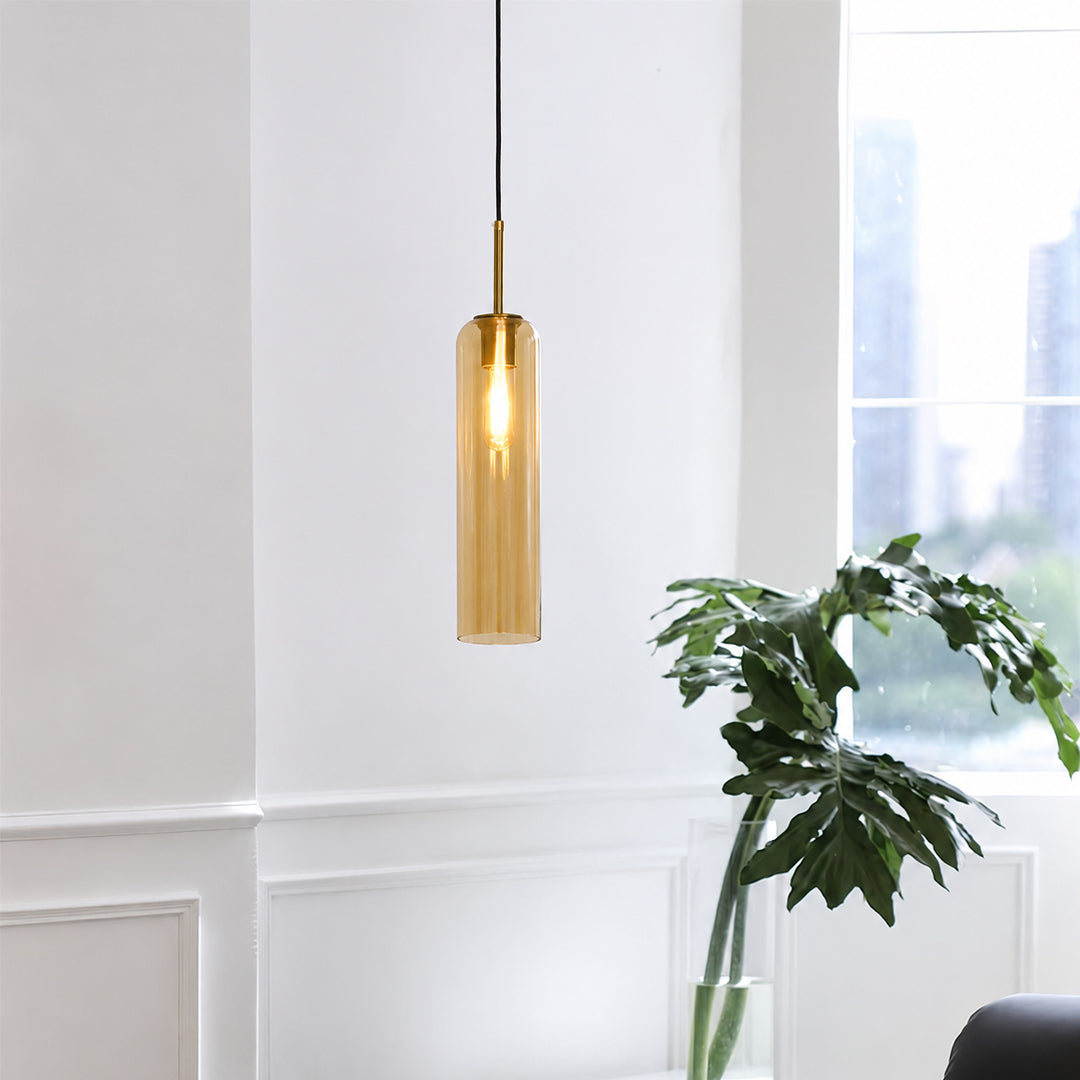 Amber glass pendant light enhancing dining spaces with luxurious charm and contemporary elegance.