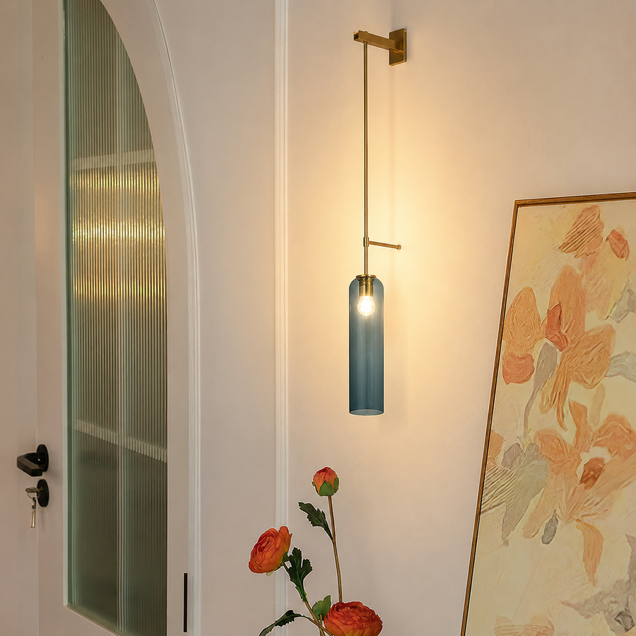 Lifestyle image of blue float suspension wall sconce for elegant bedroom decor styling and modern home interior design.