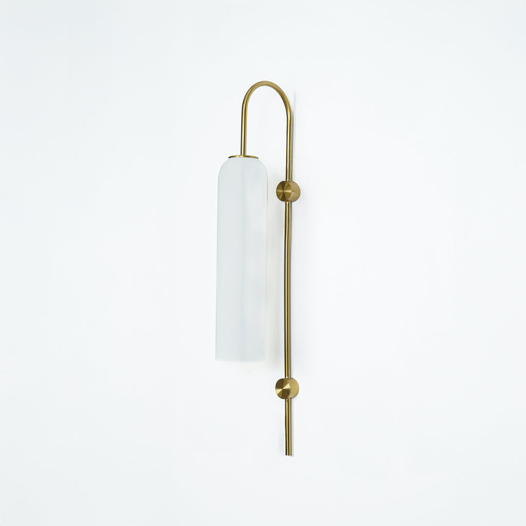Modern gold metal wall light with white frosted glass shade for elegant bedroom and luxury decor spaces.