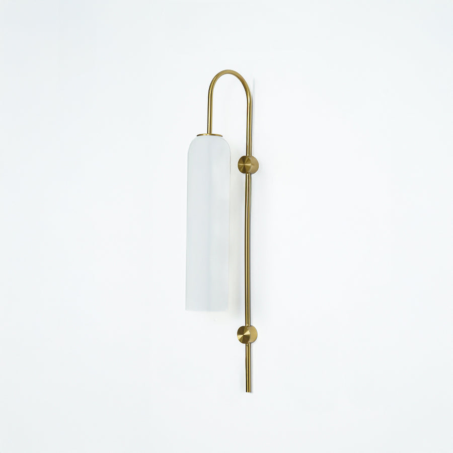 Modern gold metal wall light with white frosted glass shade for elegant bedroom and luxury decor spaces.