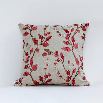 Floral cushion cover with red branch pattern displayed on white background highlighting fabric texture color detail and square shape.