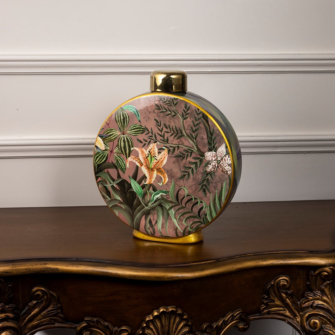 Round ceramic jar featuring detailed multicolor floral artwork displayed on a wooden console table adding vibrant decorative charm for stylish living room decor.