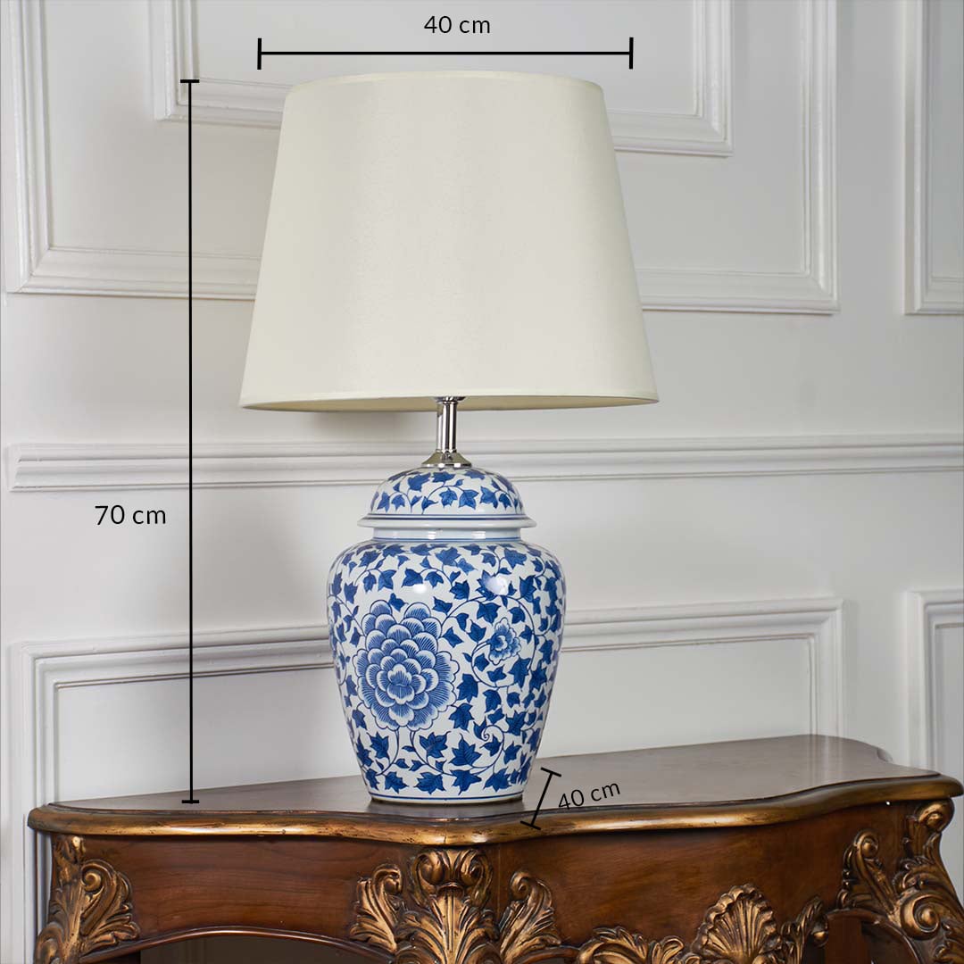 Blue and white ceramic table lamp shown with dimensions of 70 cm height and 40 cm shade width along with a 40 cm base width.