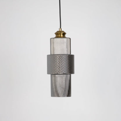 Pendant light with ribbed glass body and brass top shown off on white background for modern ceiling decoration.