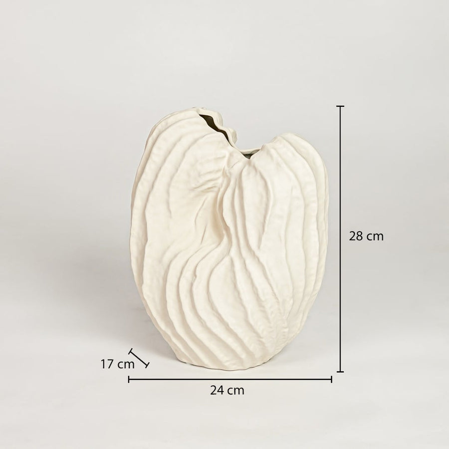 White ceramic sculpted leaf design vase measuring 28 cm height 24 cm width and 17 cm depth ideal for modern decor styling.