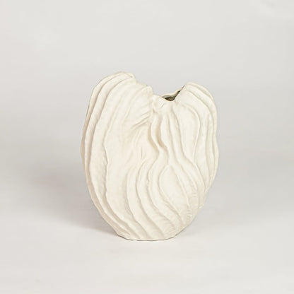 White flutter ceramic vase with sculpted organic design isolated on white background for elegant home decor display.
