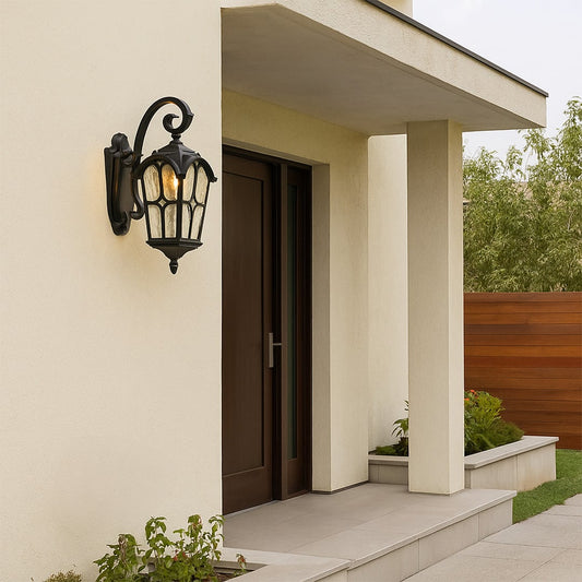Classic black outdoor wall lantern with curved arm and textured glass panels enhancing exterior wall decor with timeless charm.