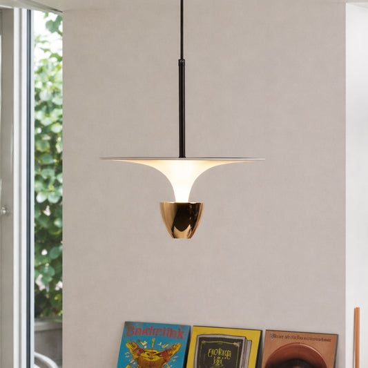 Modern black and white pendant light hanging in stylish living room and contemporary dining space decor styling.