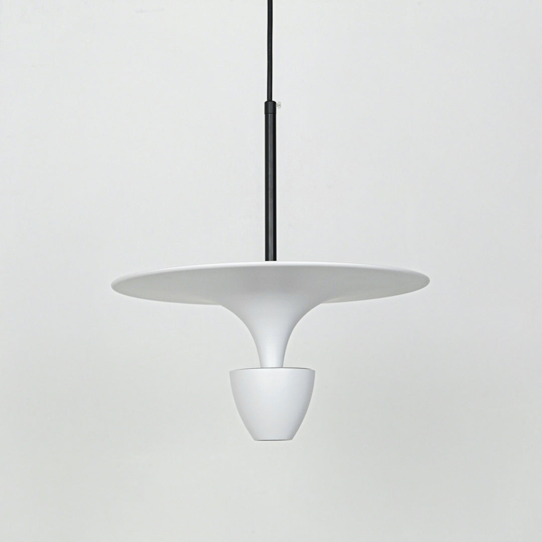 Modern white pendant light suspended on white background for elegant dining room and modern home decor styling.