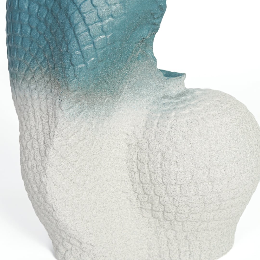 Textured blue and white ceramic artistic sculpture for elegant console table and office decor accent.
