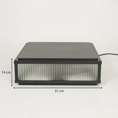 Modern rectangular outdoor wall light with black metal frame and ribbed glass diffuser on neutral background 51 cm width 14 cm height ideal for exterior decor lighting.

