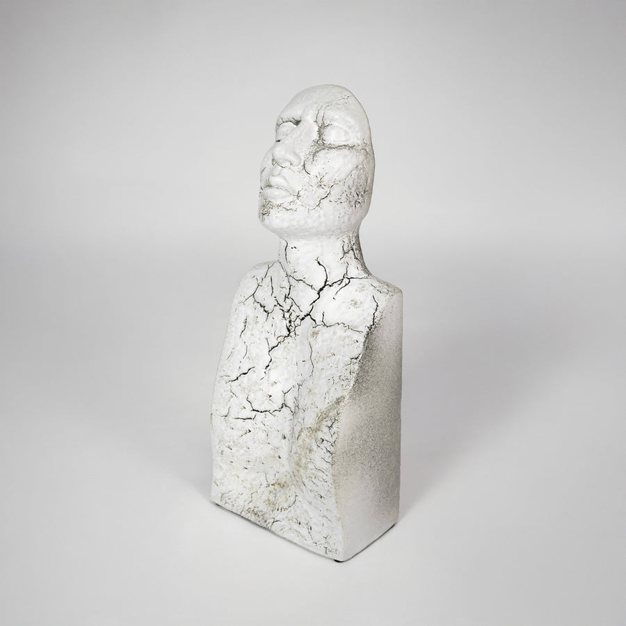 White marble texture face sculpture for modern console table placement and artistic indoor decor styling accent piece.