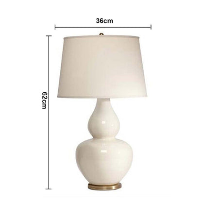 White shade white ceramic table lamp with size 53cm height and 36cm width on plain background for modern minimal décor.