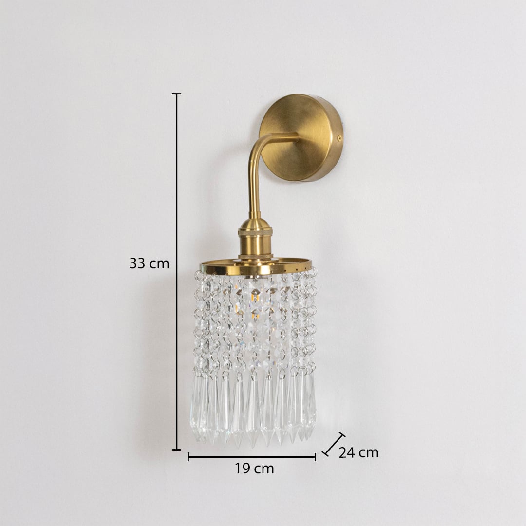 Gold metal crystal wall light dimension image with 33 cm height and clear crystal shade for luxury wall decor.