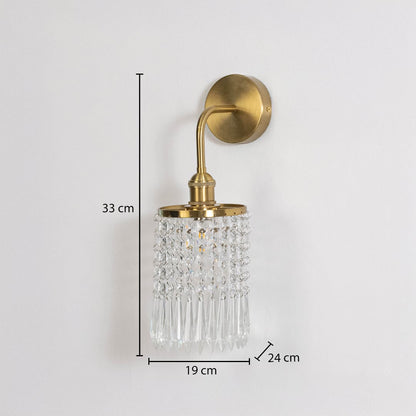 Gold metal crystal wall light dimension image with 33 cm height and clear crystal shade for luxury wall decor.