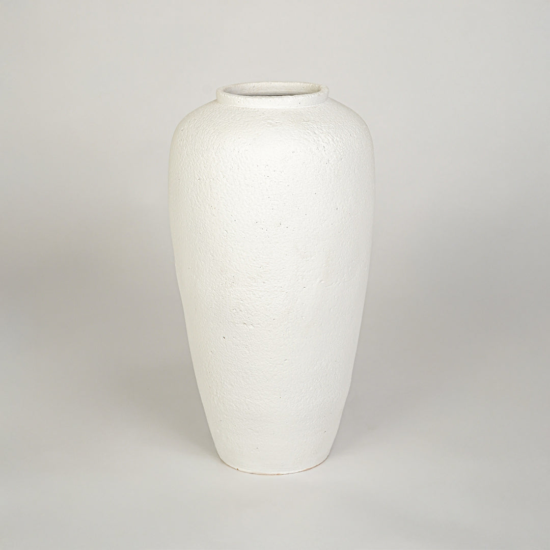 White background image of white ceramic floor vase for elegant home decor styling with textured matte finish.