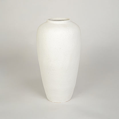White background image of white ceramic floor vase for elegant home decor styling with textured matte finish.