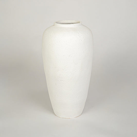 White background image of white ceramic floor vase for elegant home decor styling with textured matte finish.