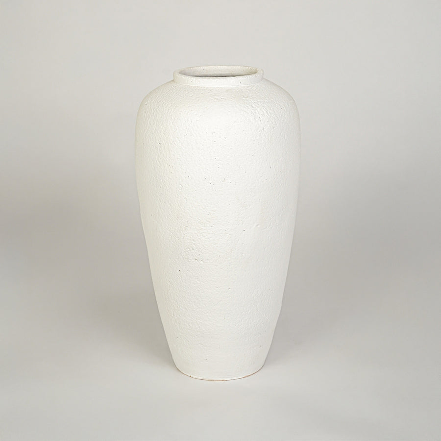 White background image of white ceramic floor vase for elegant home decor styling with textured matte finish.
