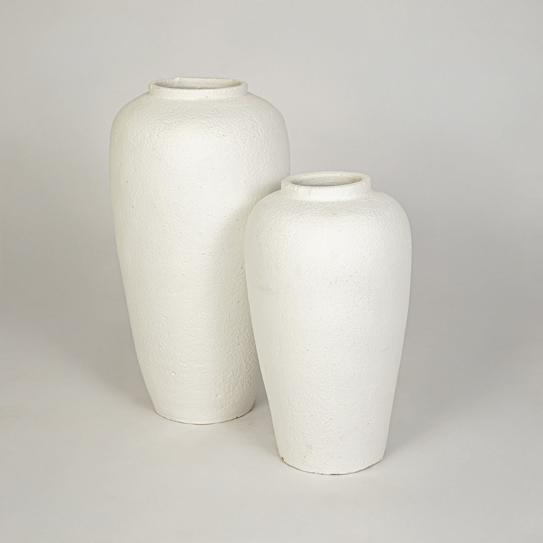 White background image of white ceramic vase set for elegant floor decor styling with textured matte finish.