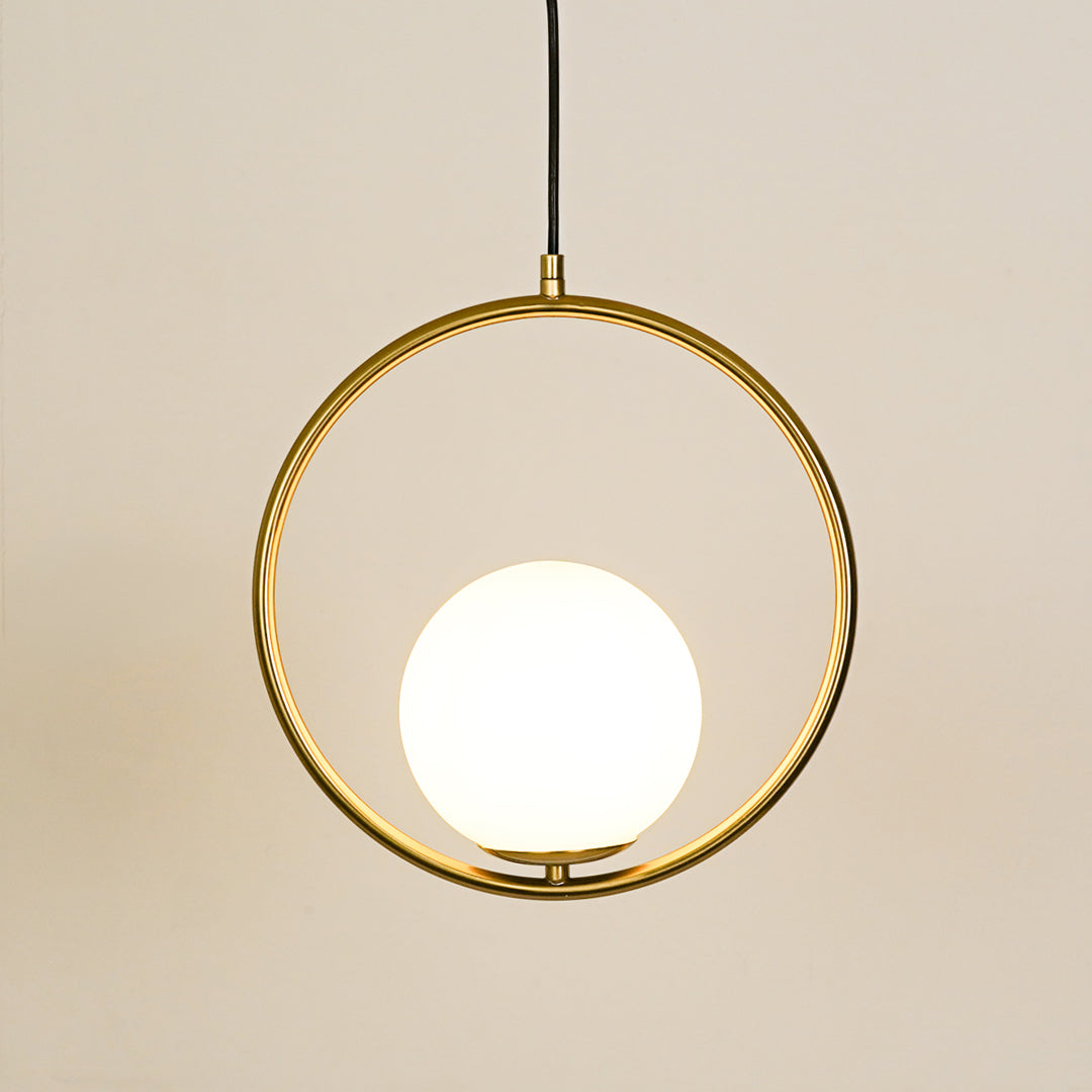 Gold metal ring pendant light with opal glass globe for modern interiors on white background image.
