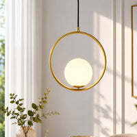 Modern gold metal ring pendant light with opal glass globe for bedroom living room and warm ambient lighting.