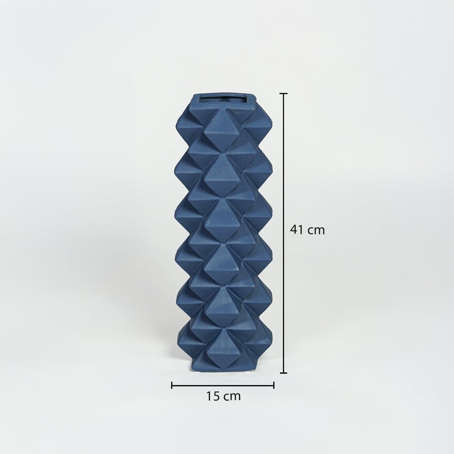 Blue ceramic geometric floor vase measuring 41 cm height and 15 cm width ideal for modern corner decor placement.