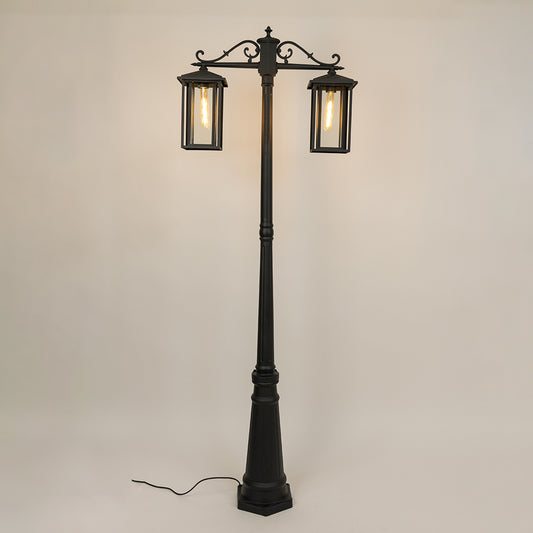 Vintage outdoor street lamp with dual lantern shades for elegant exterior decor styling use.