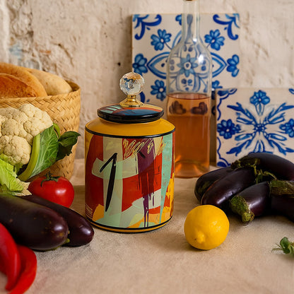 Colorful ceramic jar adding a lively artistic accent to a kitchen counter with fresh vegetables and rustic decor.
