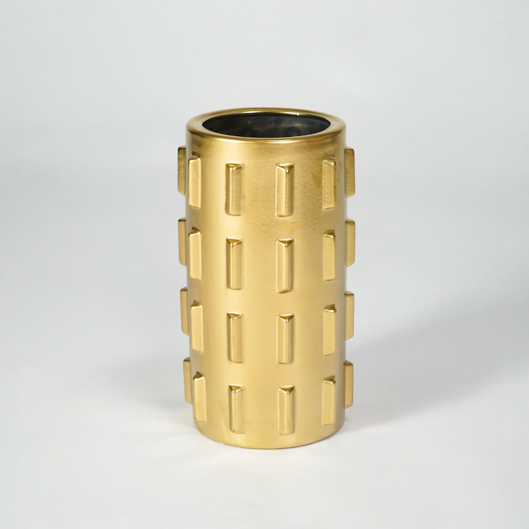 Gold metal planter pot for luxury coffee table placement and modern indoor decor styling accent display piece.