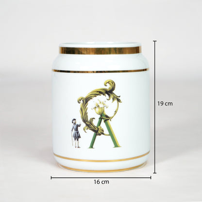 White ceramic storage jar with gold detailing dimension image with 19 cm height and 16 cm width for decor.