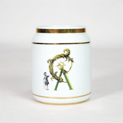 White ceramic jar with gold detailing for luxury console table placement and stylish indoor decor styling accent.