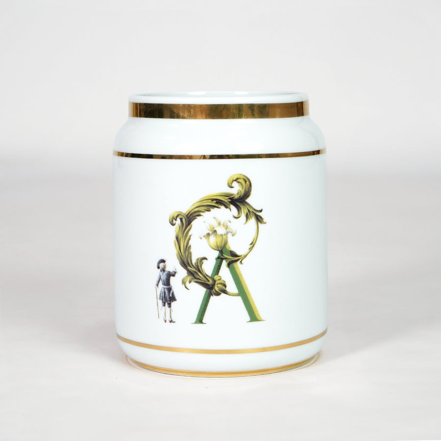 White ceramic jar with gold detailing for luxury console table placement and stylish indoor decor styling accent.