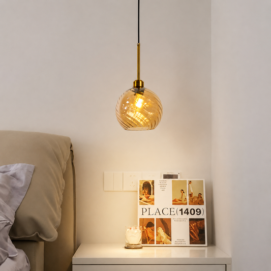 Lifestyle image of glimmer glow gold glass hanging pendant lamp for elegant dining room decor styling and modern home lighting design.