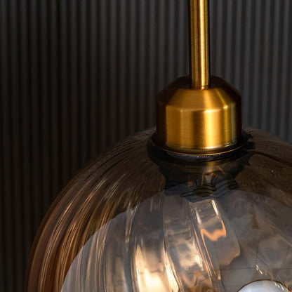 showing textured glass details and soft reflections for a modern luxury lighting look.