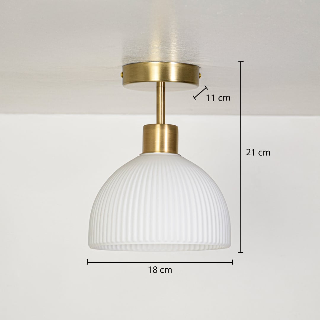 Gold metal ceiling light with ribbed white glass shade measuring 21 cm height and 18 cm width suitable for indoor ceilings.