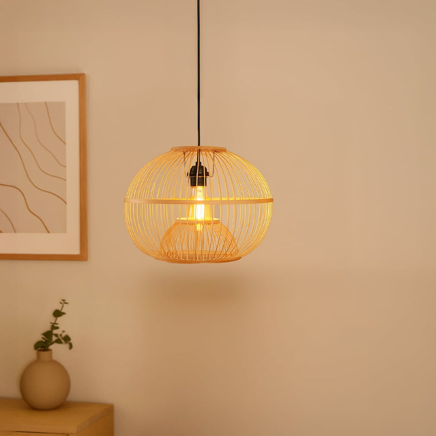 Rattan pendant light creating a warm earthy glow adding natural charm to modern interiors.