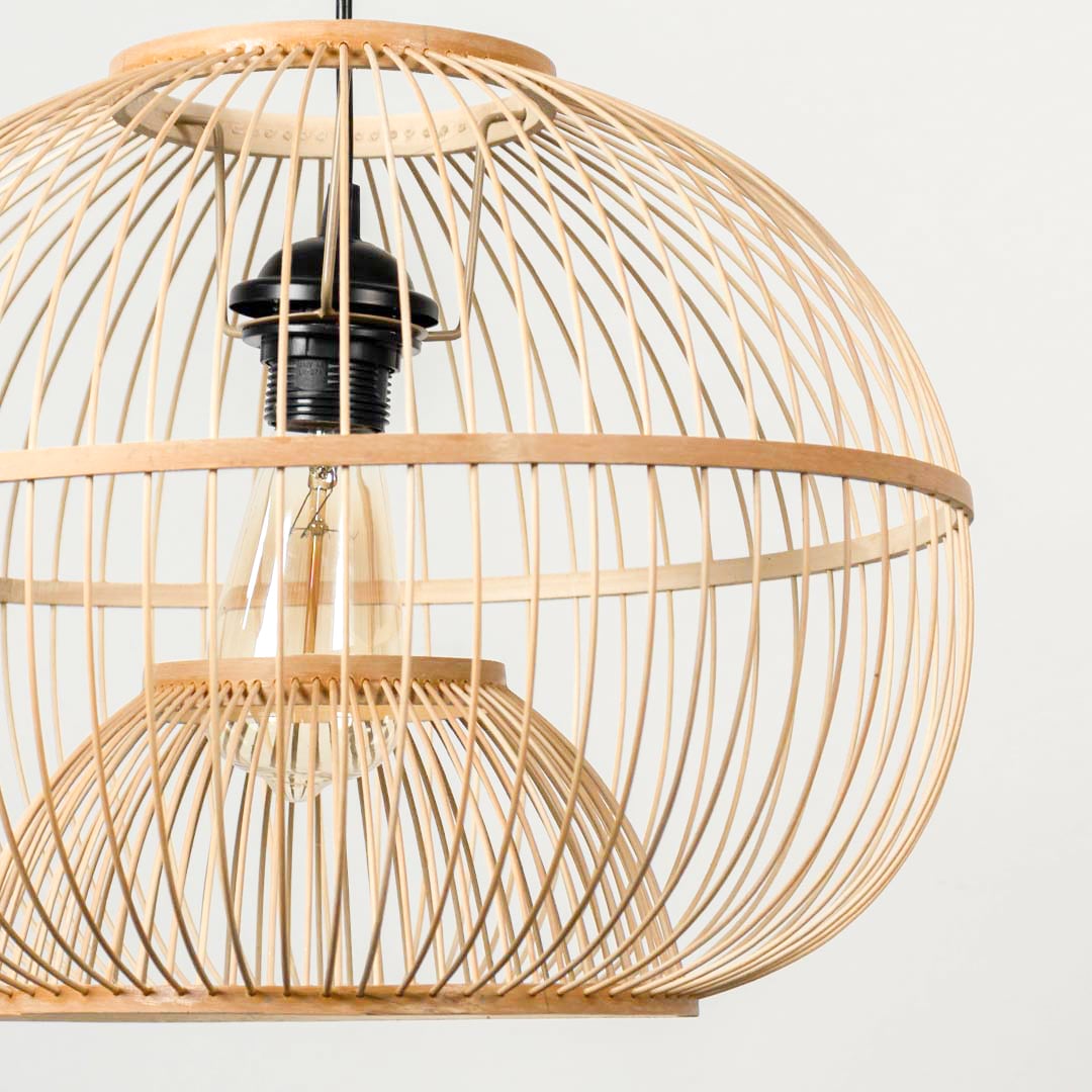 Closeup view of rattan pendant light highlighting fine weave pattern and detailed craftsmanship.