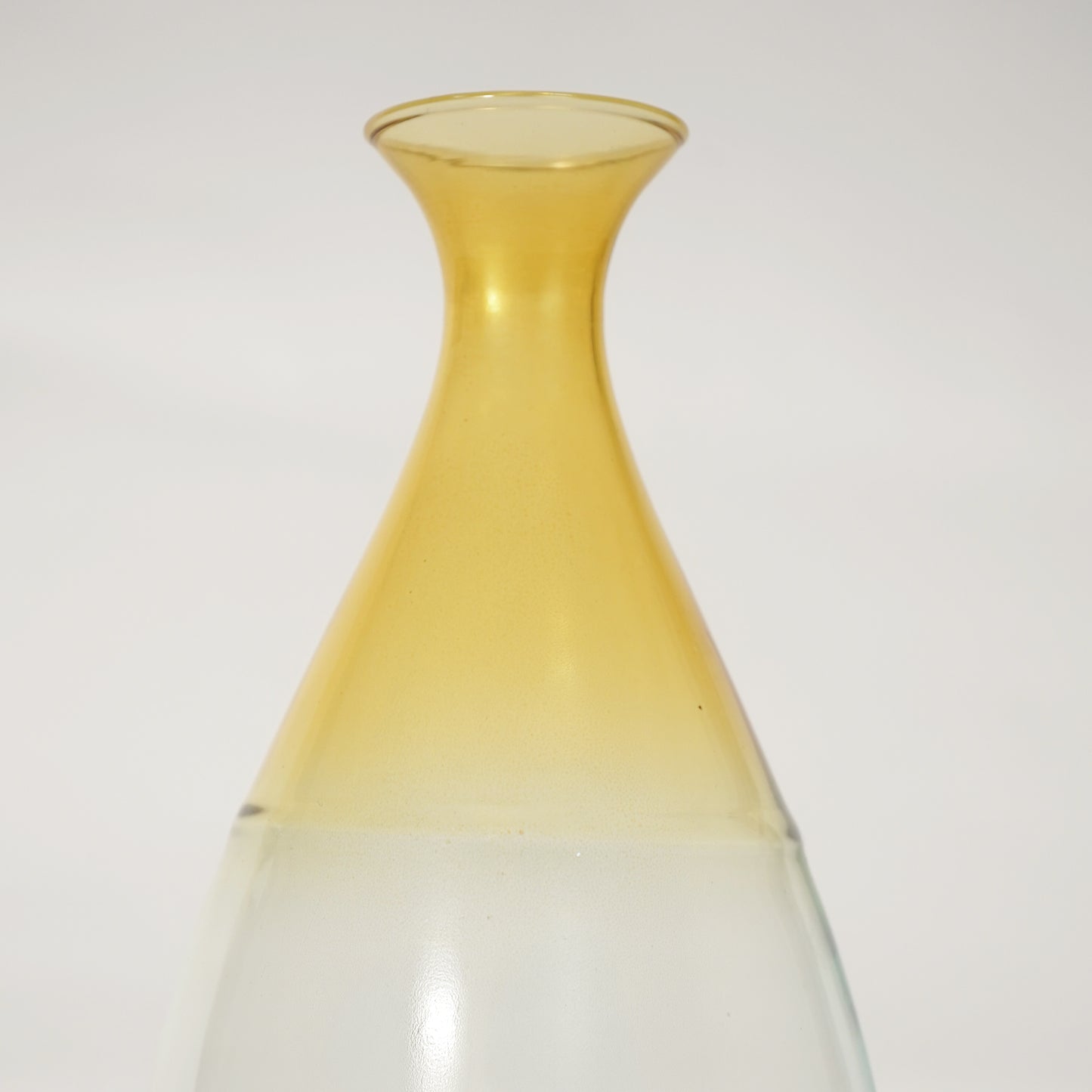 Closeup image of goccia glass vase for elegant tabletop decor styling and modern living room interior home room design.