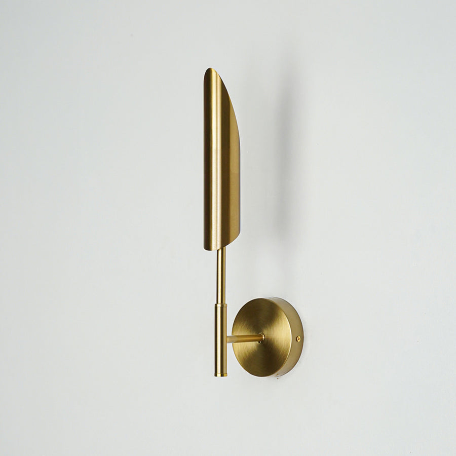 Gold metal wall light with sleek vertical blade design and round mount ideal for modern bedroom or hallway wall decor.